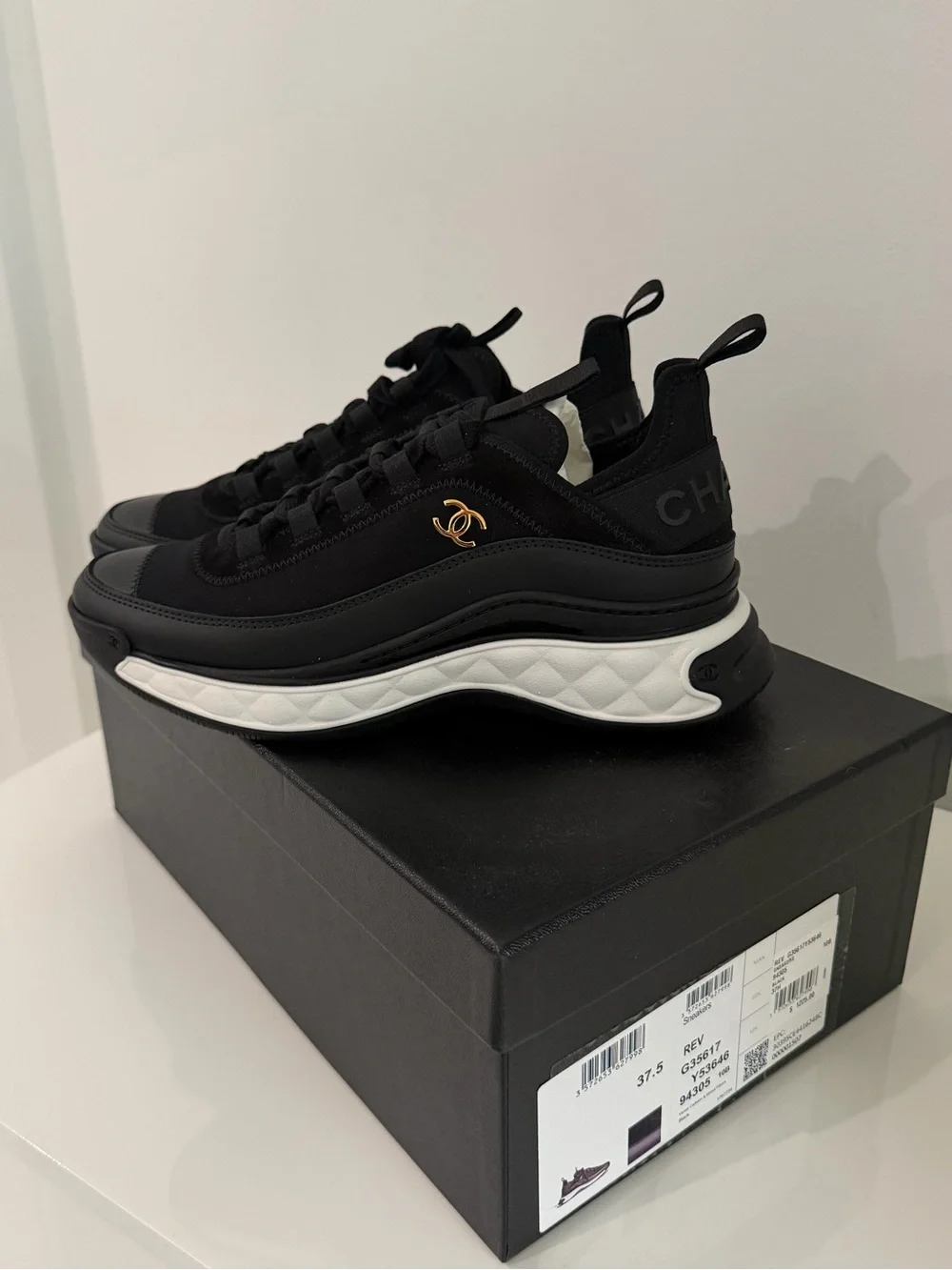 CHANEL Black and White Low-Top Logo Sneakers